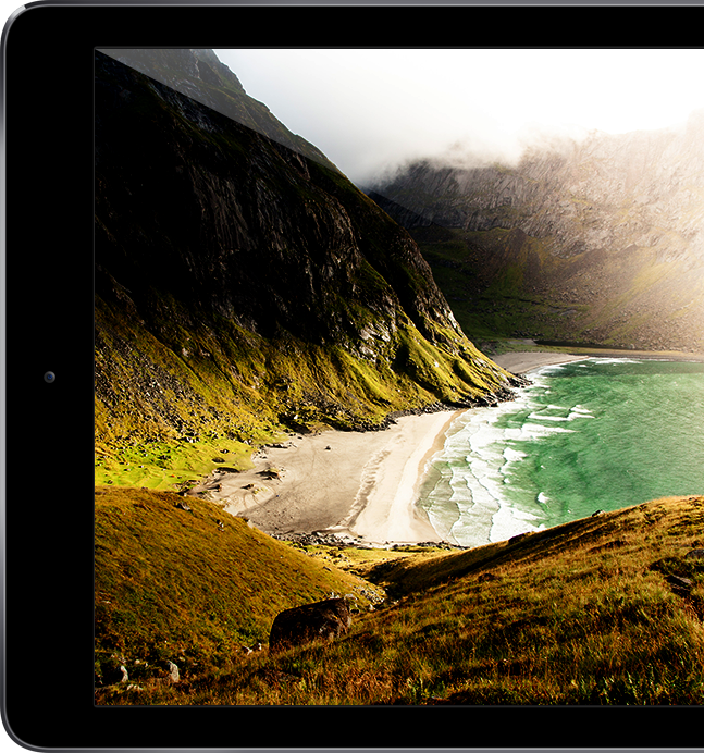 tablet with a picture of a coastal shore